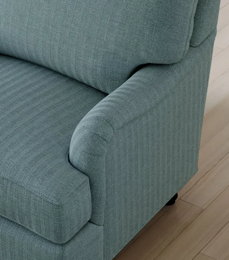 3D texturing services — close-up render of a blue fabric armchair showing upholstery texture